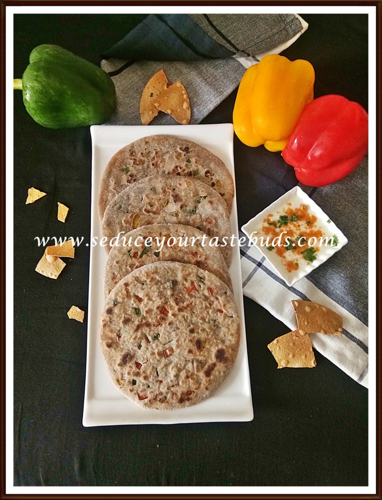 Papad And Capsicum Stuffed Paratha Recipe - Seduce Your Tastebuds...